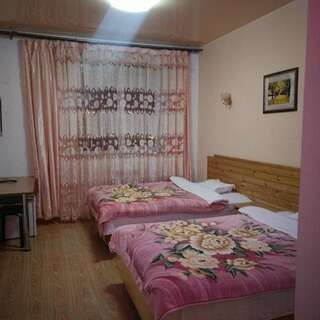 Гостиница Исток Владивосток  Семейный номер с двумя двуспальными кроватями-5